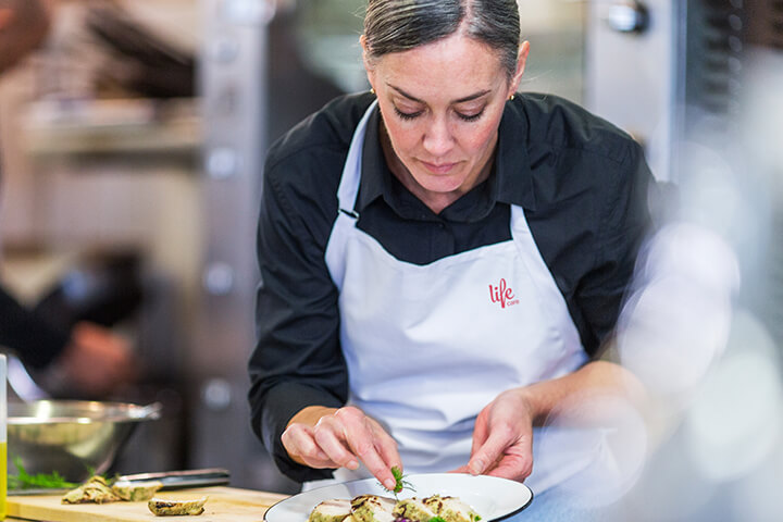 Food preparation at Life Care Gaynes Park Suites